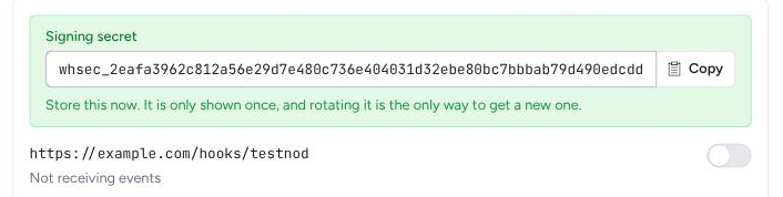 The webhook signing secret shown once after an endpoint is created, with a button to copy it